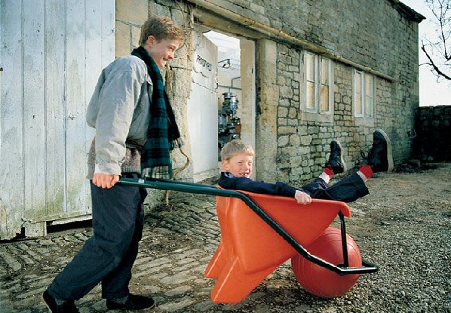 nconventional plastic barrow – with a ball rather than a wheel